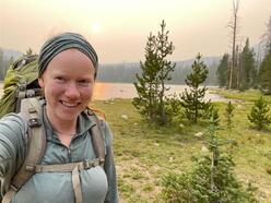 Sarah, a caseswork intern at the IRC. Photo of her hiking