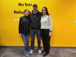 Jill Baker, Rob Kain, and Holli Turner standing in the IRC.