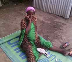 A pregnant woman in a refugee camp