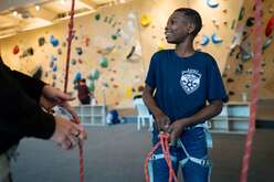 Youth at climbing gym.