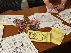 Taking a break from dancing to color and watch a movie