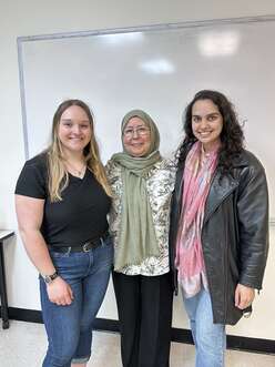 IRC NJ Adult Education student with IRC staff