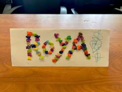 name tag made by a mother and child