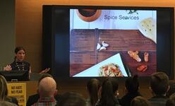 Kate Idzorek, Spice Kitchen Incubator program manager, shared success stories of women entrepreneurs.