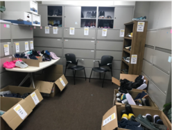 A picture of distribution items set up at the IRC in NY office in different stations.