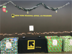 A picture of distribution items set up at the IRC in NY office in different stations.