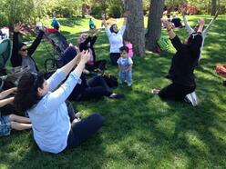 Arab women's support group practicing yoga
