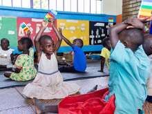 A group of children in a classroom