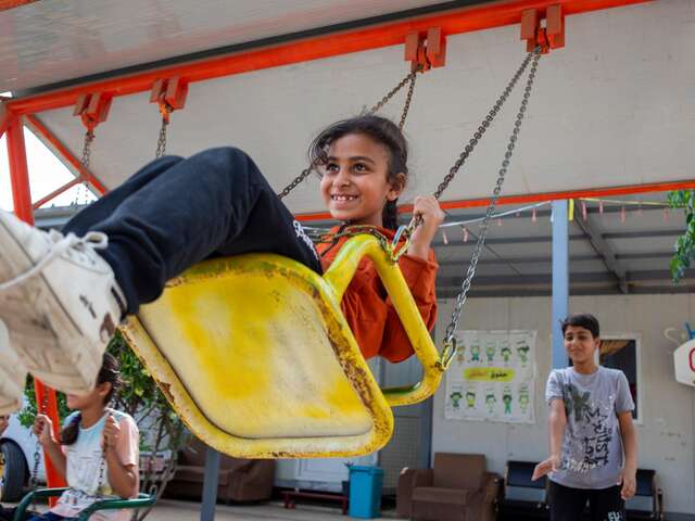 Mädchen auf einer Schaukel