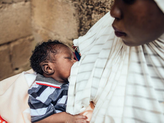 20-year-old Hussiena Ibrahim breastfeeds her baby, Bello Ibrahim who is just 7 days old.