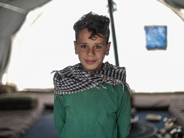 Omar smiles for the camera