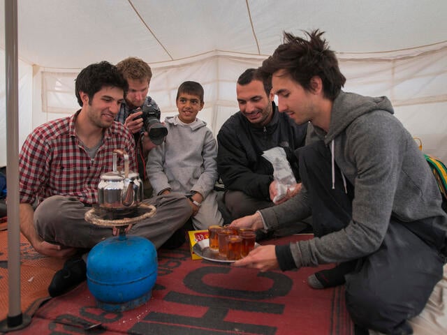 IRC Salam Neighbor team in tent in Zaatari camp