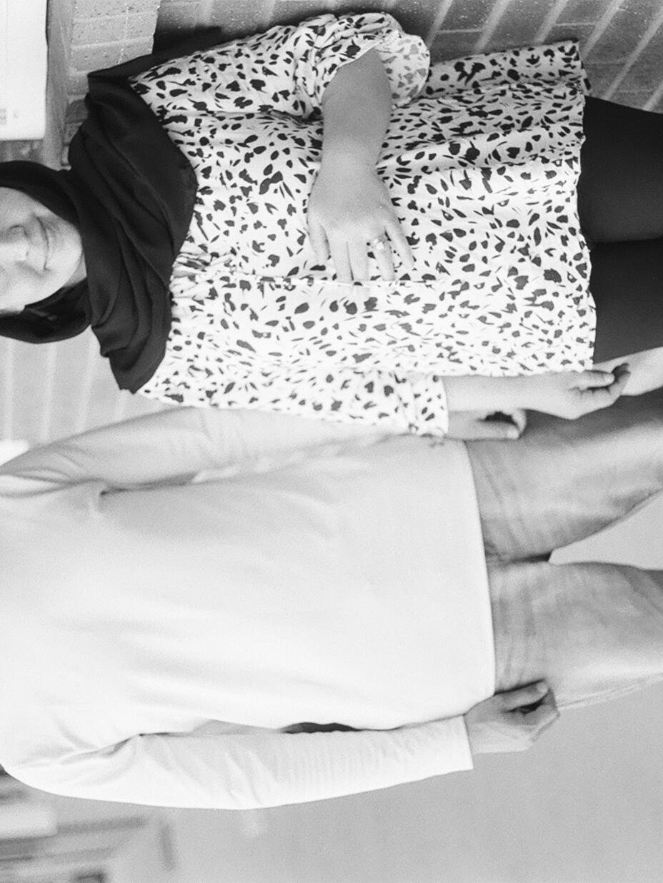 Farzana and Aminullah stand outside their apartment in Salt Lake City, UT.