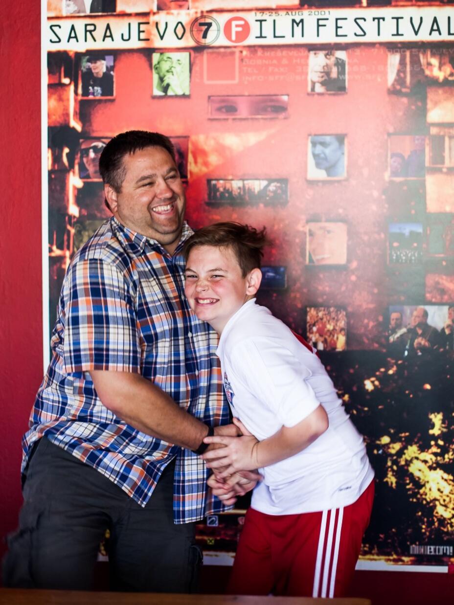 Enes with his teenage son Ismet.