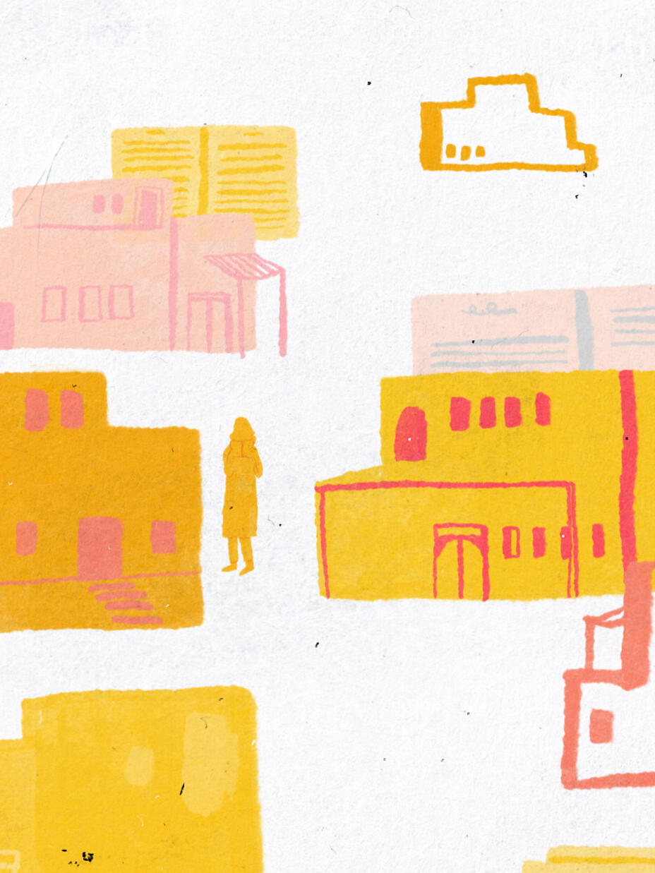 One Afghan girl walks between buildings