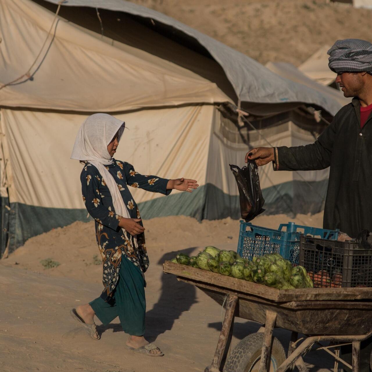 En afghani man och barn