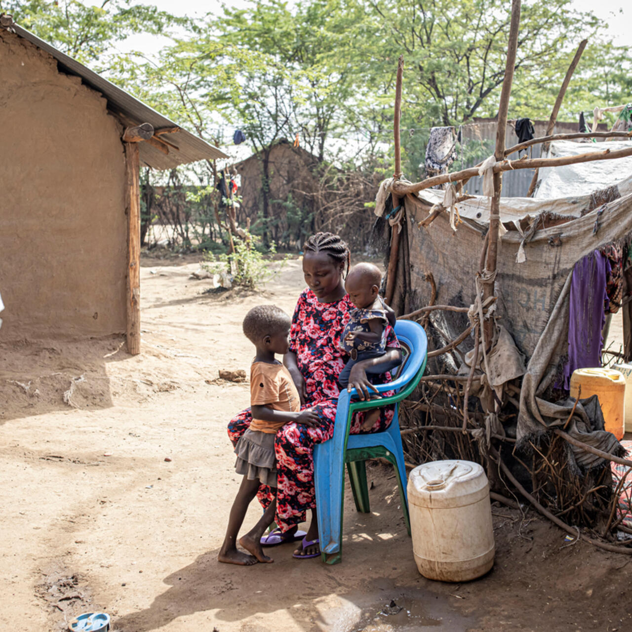 Judith Idiengol, 27, with her daughter Vanessa, 1, and Jennevive Tasha, 5, at their home in Kakuma Refugee Camp, Turkana, Kenya