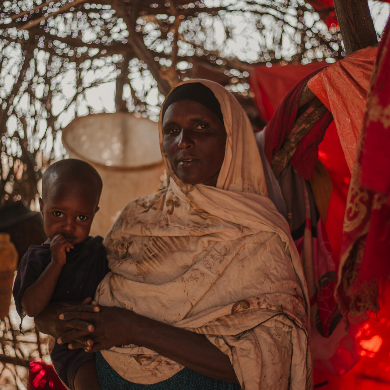 Sehiwi Kebdid, 35, and her baby Nejma Bashir live in Ethiopia's Somali region, Sehiwi says the drought has caused her to lose a lot of her livestock.
