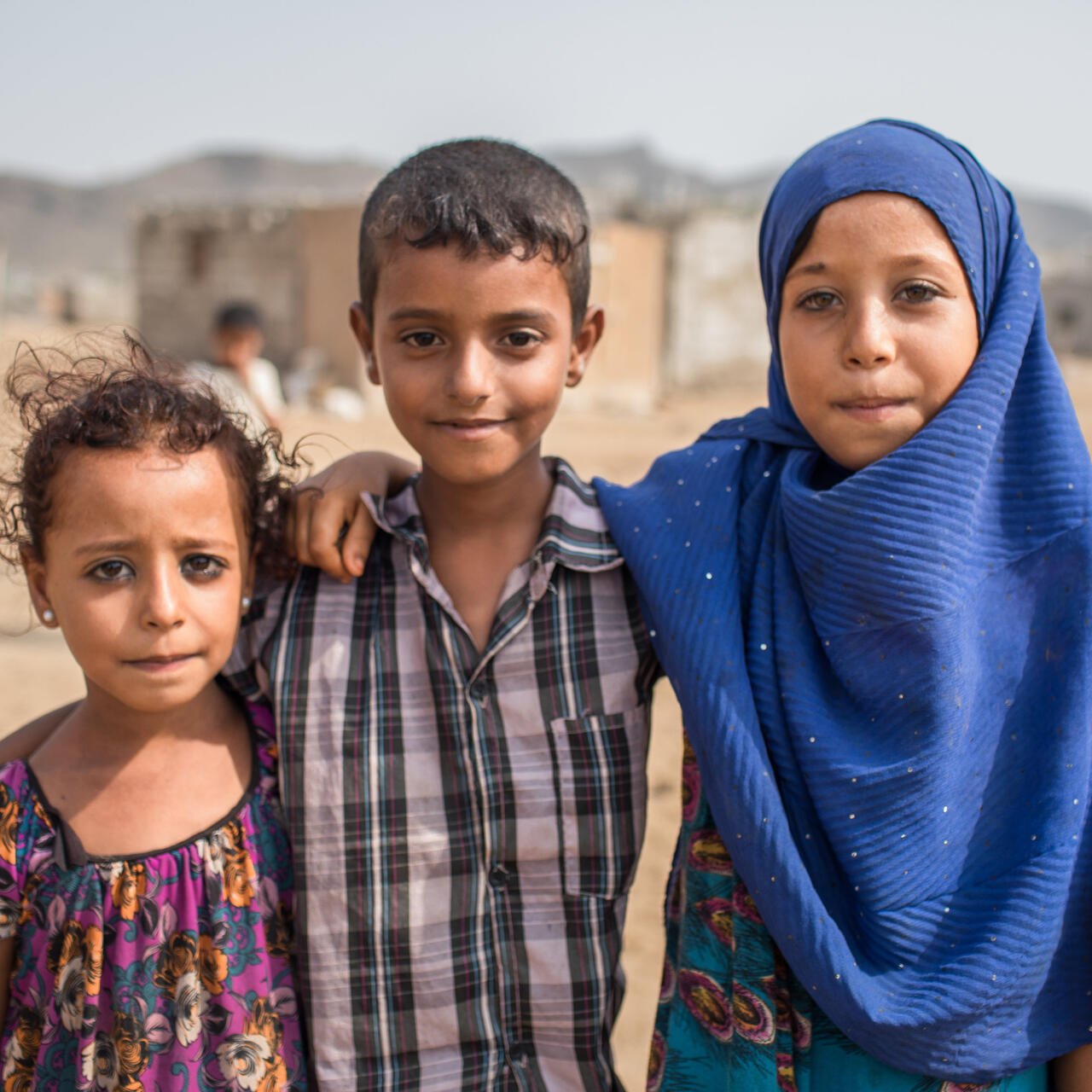 Three children in a remote village in Yemen