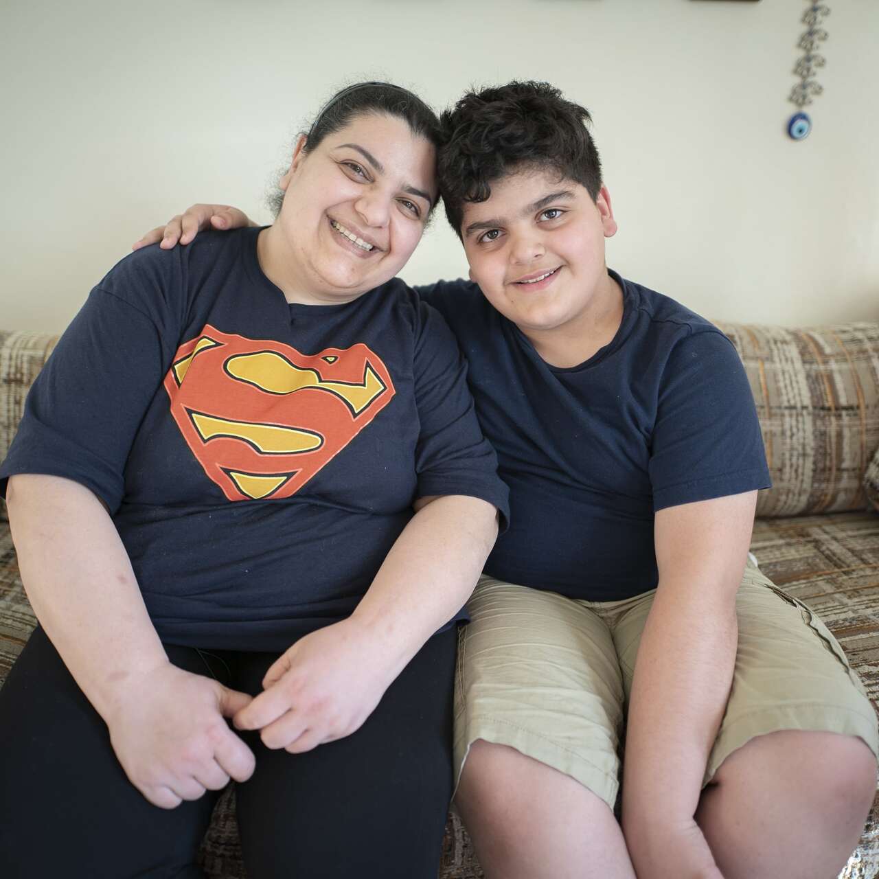 Iraqi refugees Taghreed and her 10-year-old son Yousif at their home in Seattle