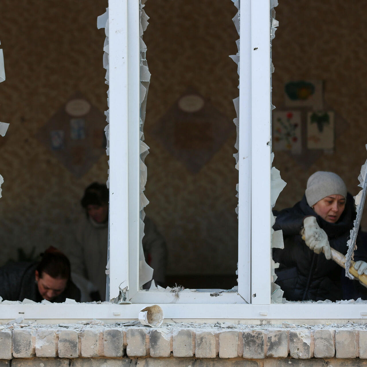 A view of a broken window at School in Ukraine after a shelling attack.