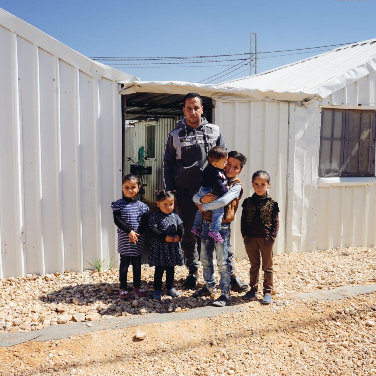 Mohammad with his family in Jordan
