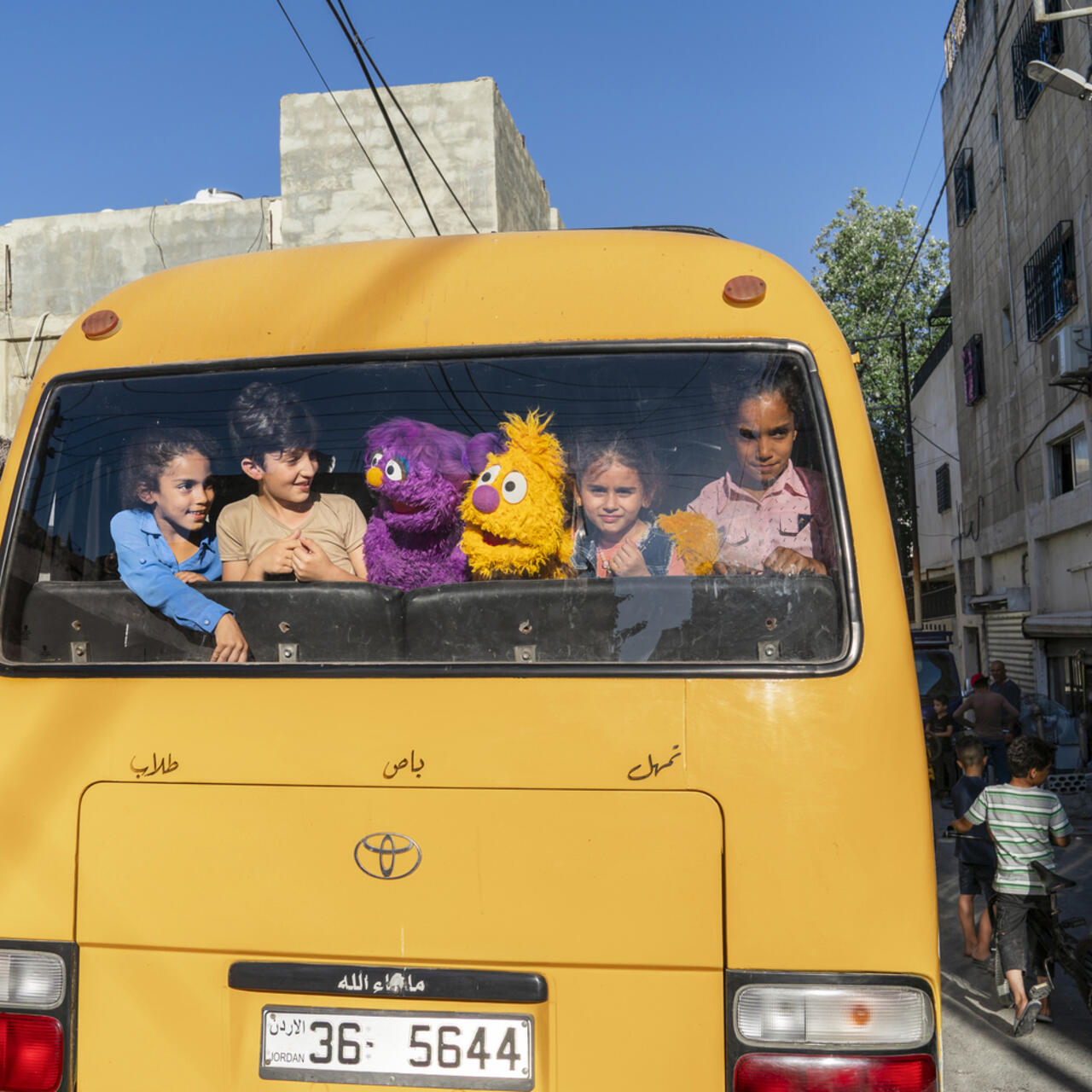 Basma and Jad from 'Ahlan Simsim' take the bus with new friends in Amman, Jordan