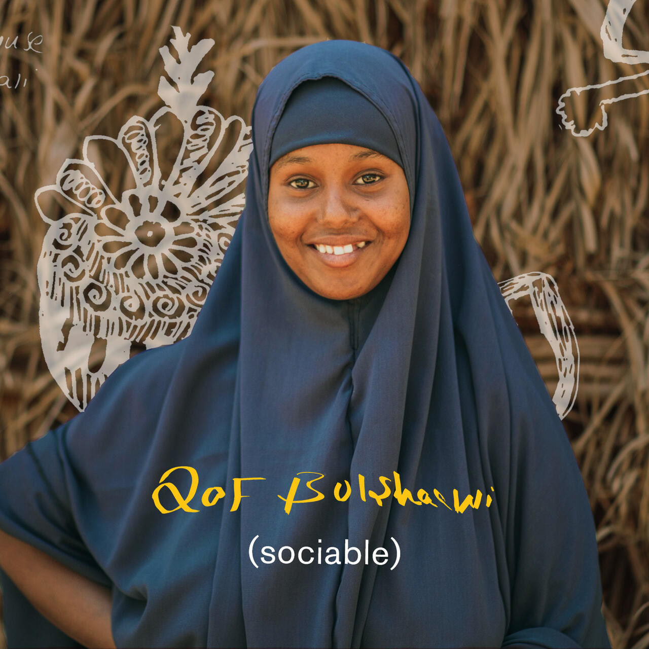 Nurta, who lives in Helowyn camp in Ethiopia, smiles. There is text on the photo that reads "sociable" in English and Somali. 