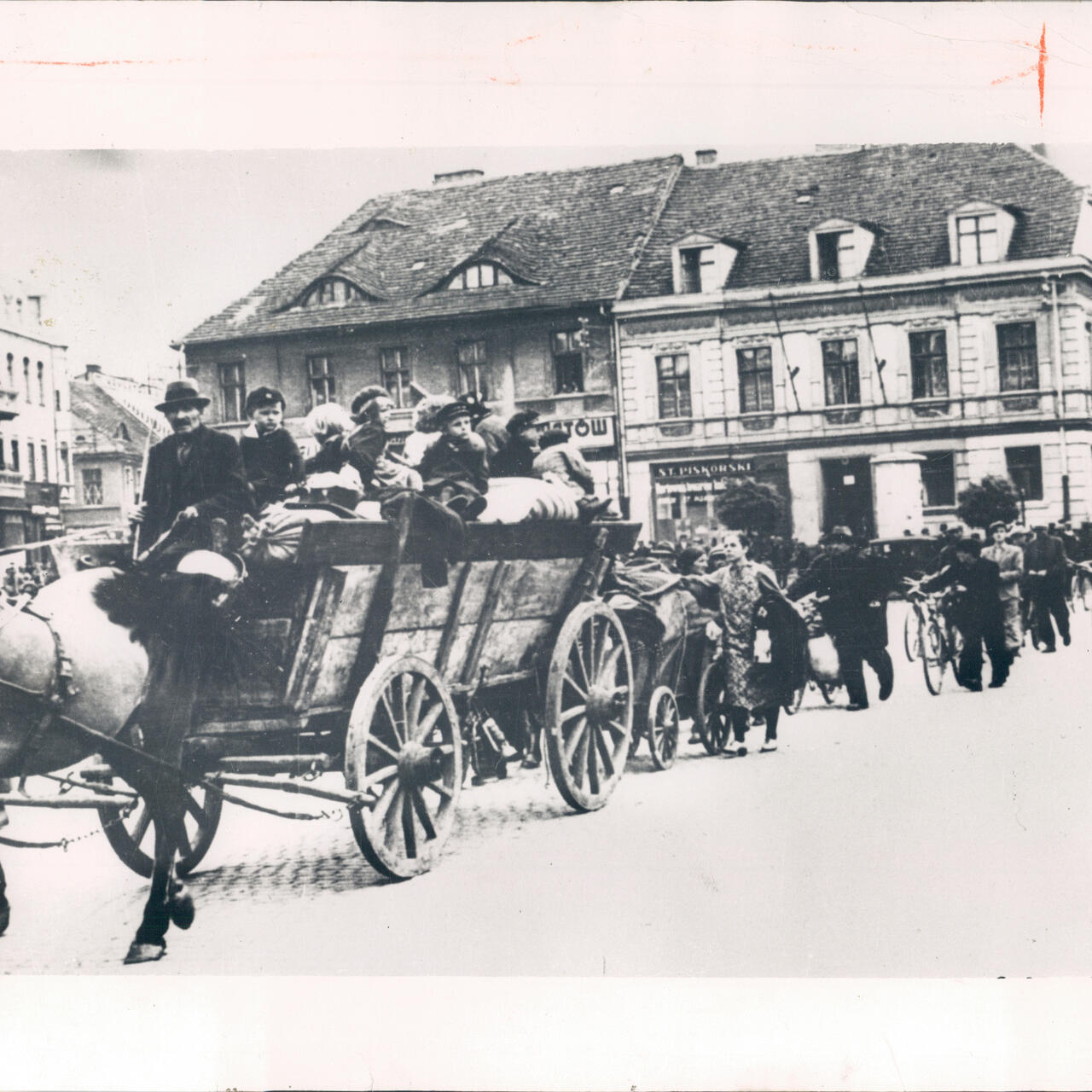Polish refugees in a horse-drawn cart with their possessions