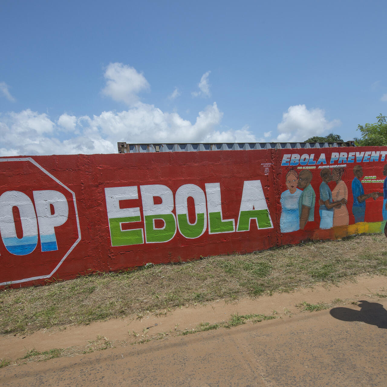 A brightly painted mural in Monrovia, Liberia reads "Stop Ebola"