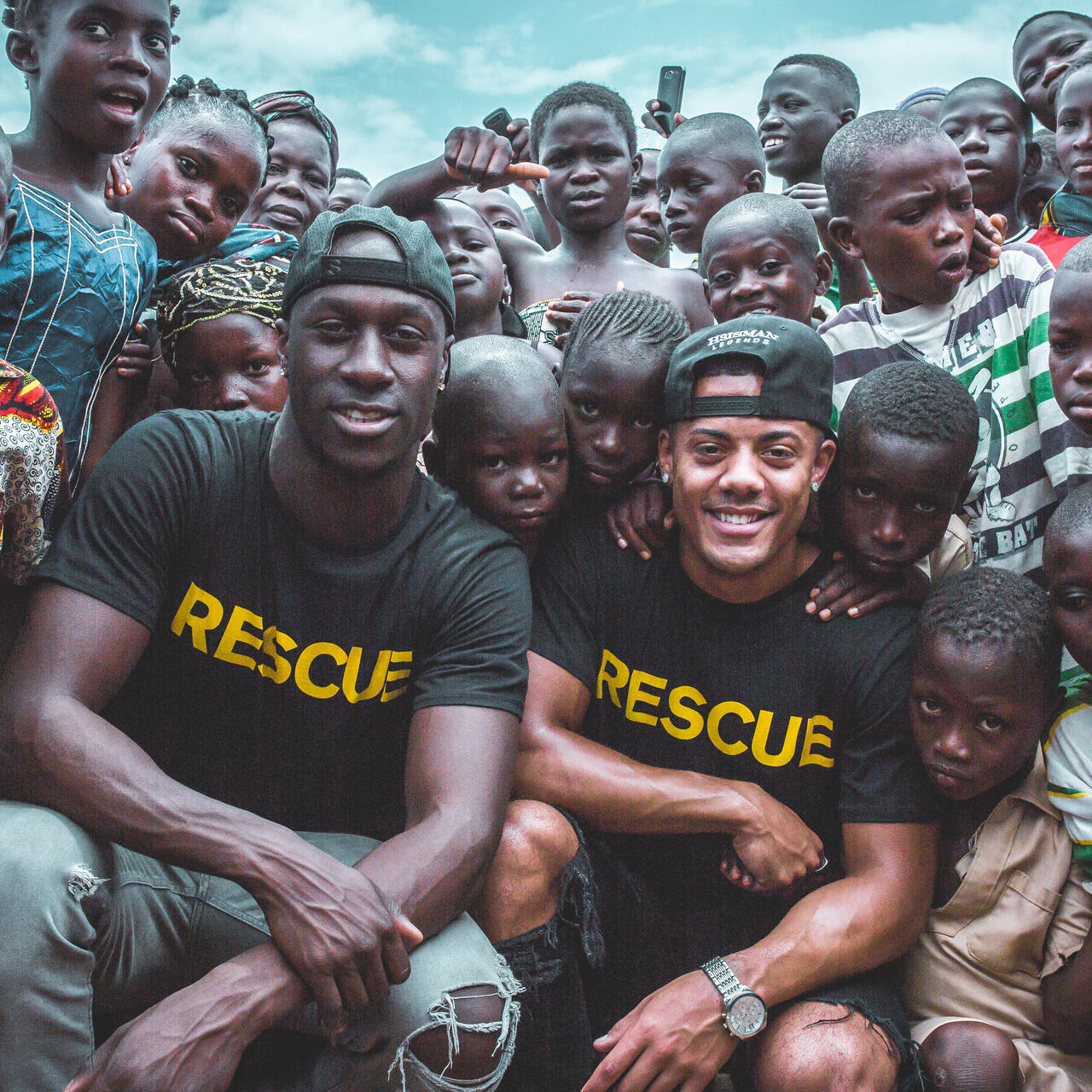 Nico & Vinz with a group of children in Ivory Coast