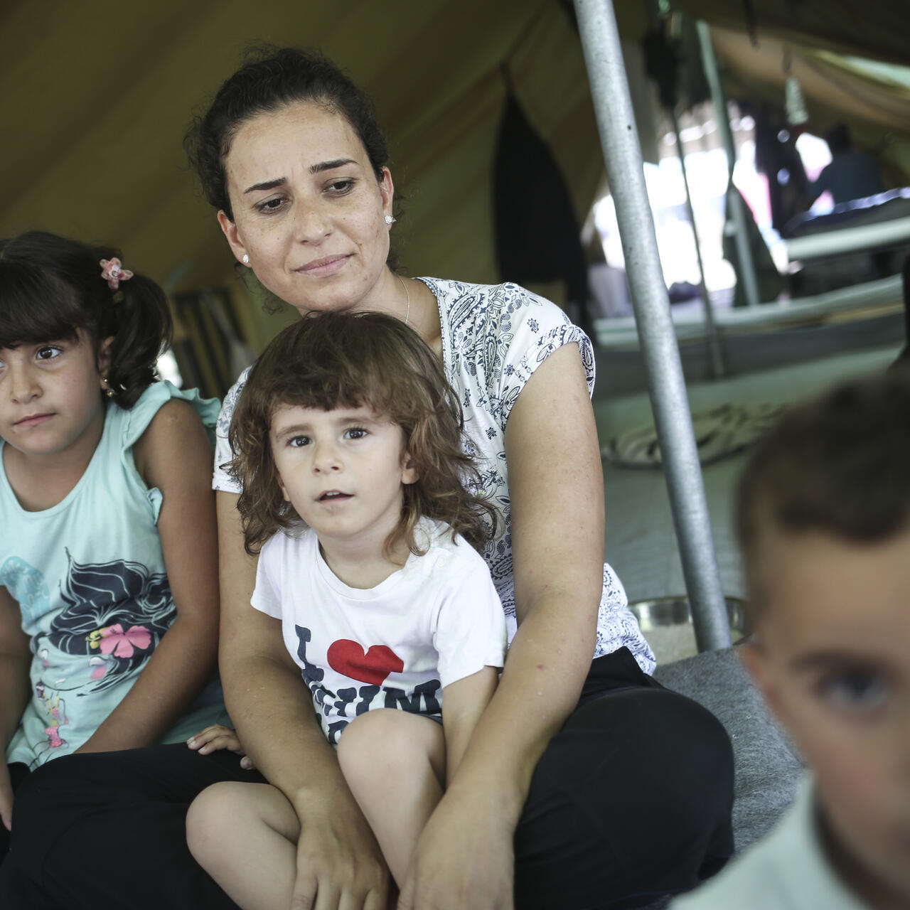 Syrian family in Alexandria refugee camp in Greece.
