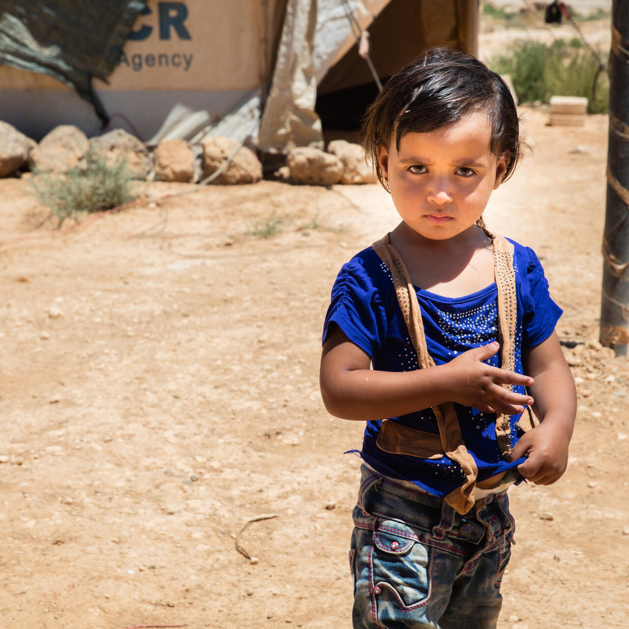 A young Syrian refugee in a refugee camp in Jordan