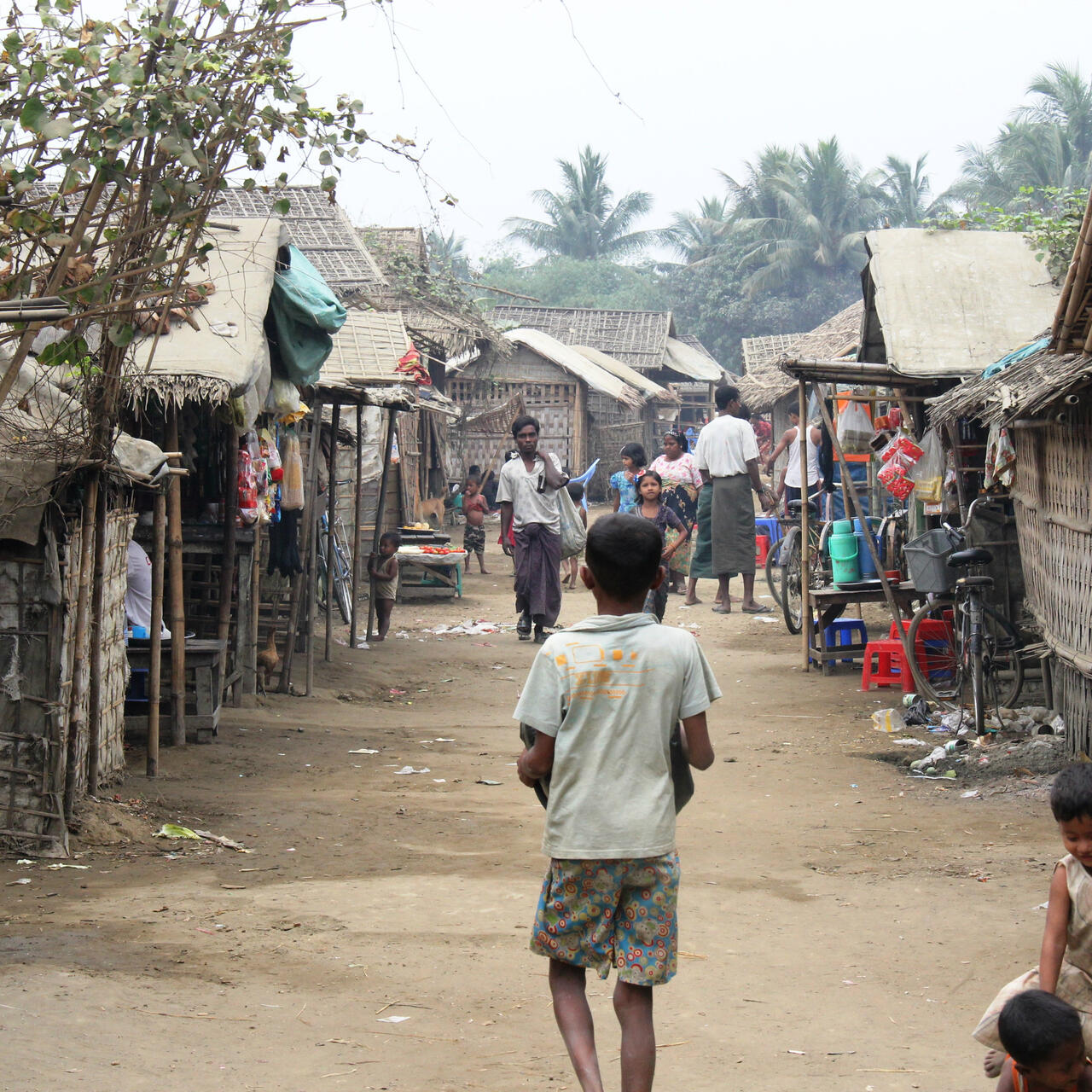 A boy walks through the streets of a crowded camp near Sittwe in Myanmar's Rakhine state.