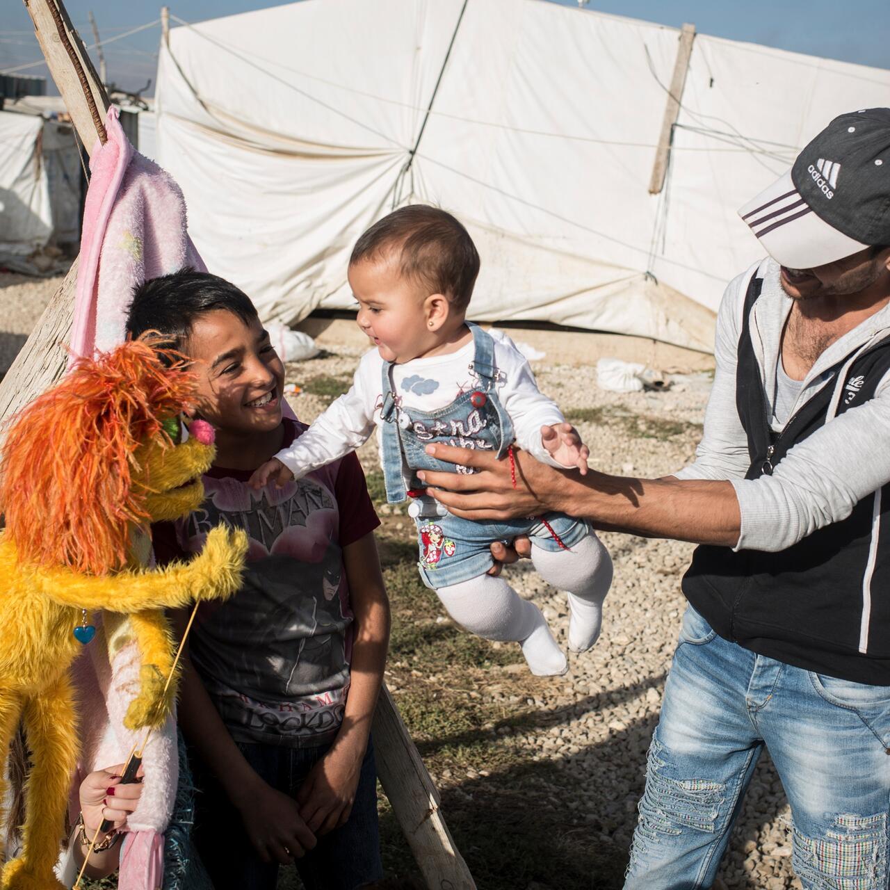 Sesame Street Muppet meets a Syrian family