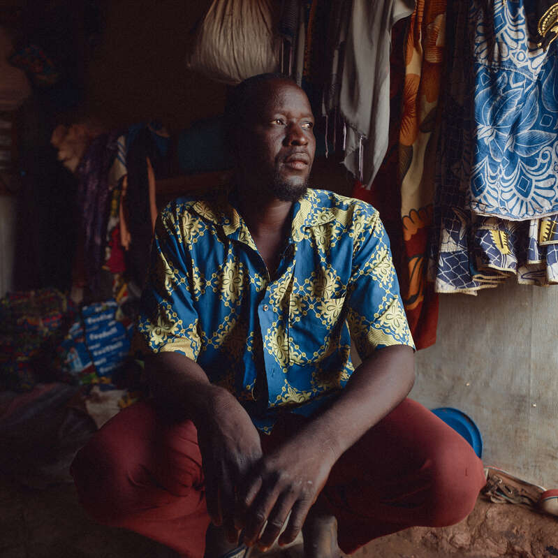 Saouta Ousseni, 40, fled violence in the Sahel Region of Burkina Faso in 2021. He now lives in an IDP camp in Kaya with 26 family members.