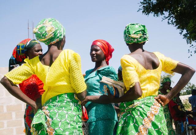 four women discussing