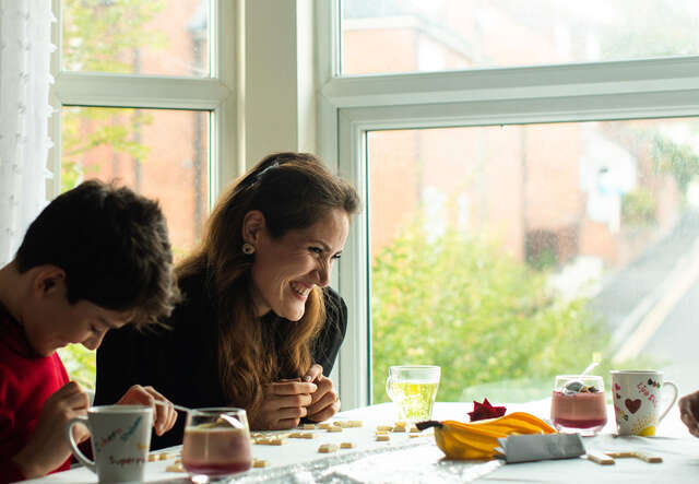 IRC client Zahra playing with her children