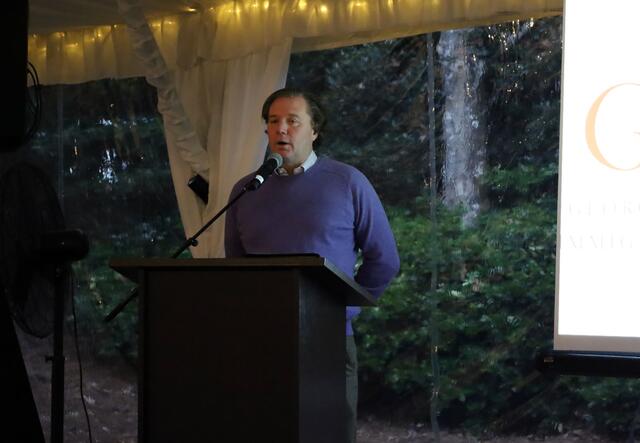 Dave Kirkpatrick speaking from behind a podium