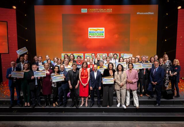 Die Empfänger von Postccode Förderung im Gruppenbild