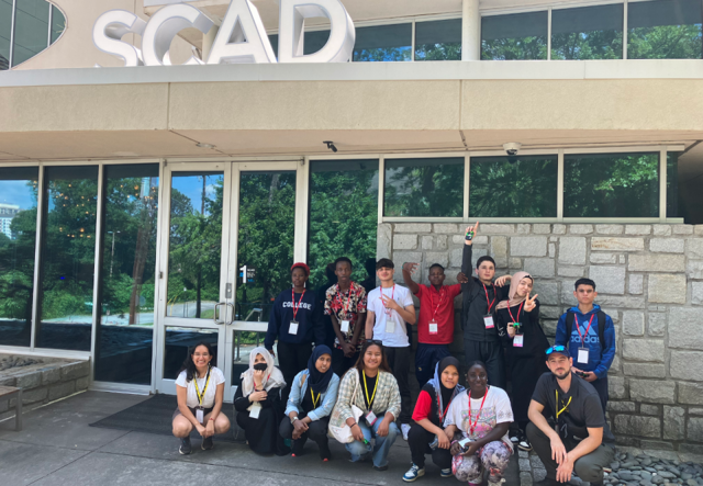 A group of high school summer camp students outside of SCAD.