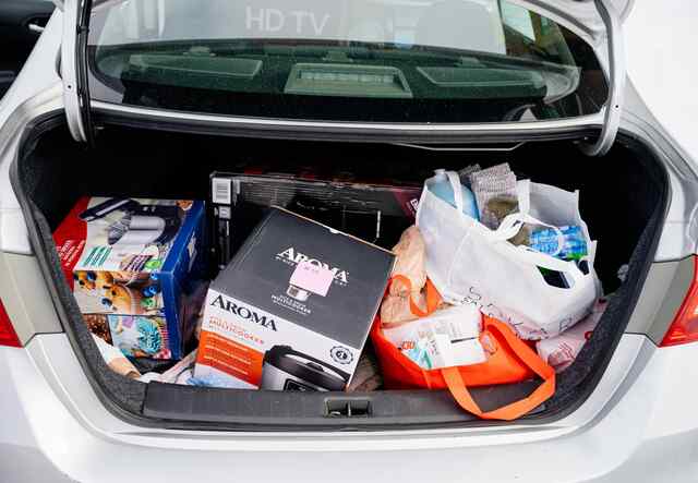 Light One Candle gift delivery in trunk of car