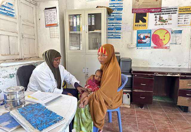 Faduma Ali Adan visits the health facility for her baby girl Maria's immunization appointment, ensuring a healthy start for her.