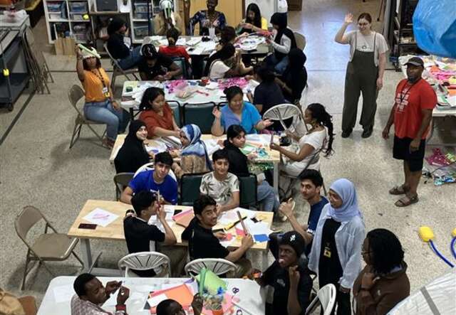 Students on a field trip at summer camp.
