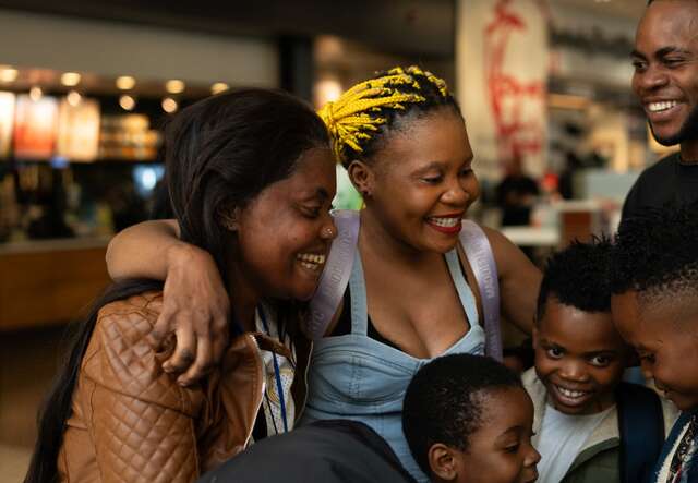 The Welo family embraces as a family once again, having been reunited with their aunt and sister Seva.