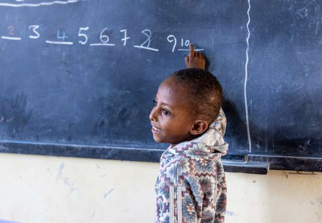 A child attends an IRC education session at a classroom in Ethiopia.
