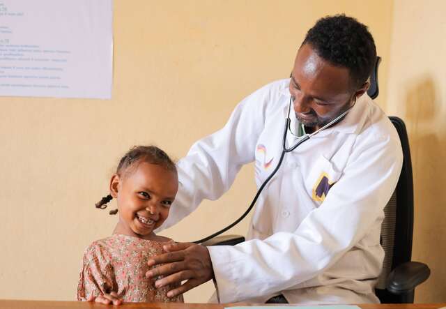 An IRC doctor treats a young patient in Ethiopia.