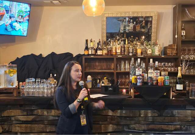 Maria Rosario Acosta, Supervising Attorney for Children's Legal Services, presents on her work.