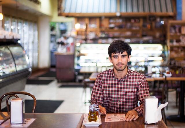 While working as an interpreter for the United States in Afghanistan, Ajmal Massoumy received threats from the Taliban and was forced to flee.