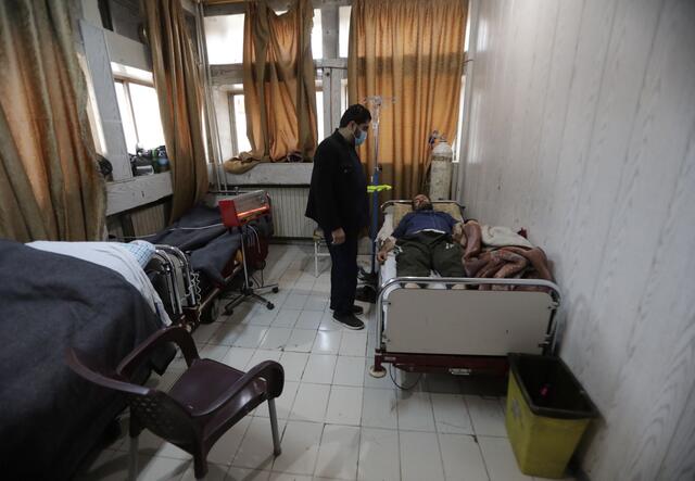 Dr Taher, a general surgeon, examines a patient at the IRC-supported Idlib Surgical Hospital in northwest Syria.